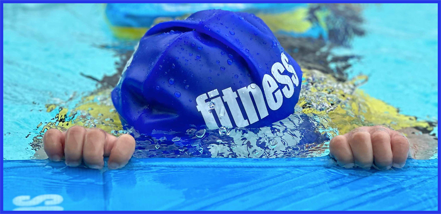 Swimmer holding the pool edge during a private swimming lesson in Sengkang